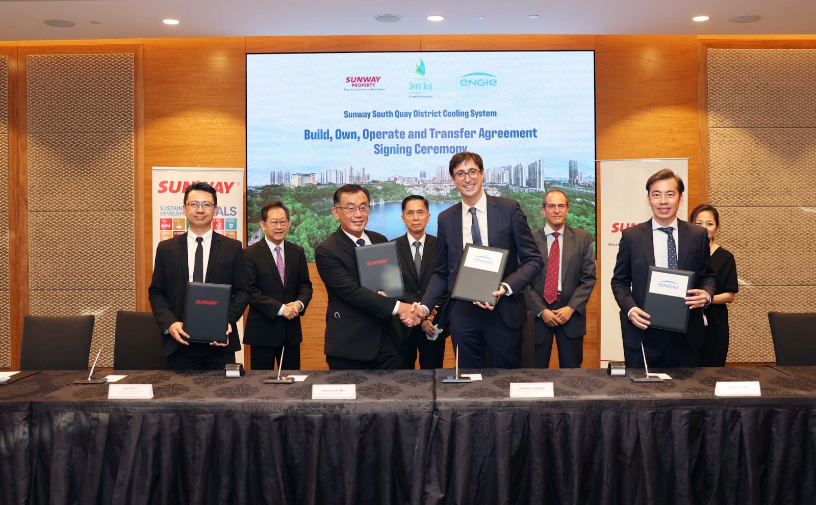 Thomas Baudlot, ENGIE CEO Energy Solutions APAC and Country Head for Southeast Asia and Sunway Property Central Region Senior Executive Director Chong Sau Min shake hands at signing ceremony in Malaysia 